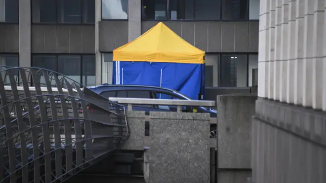 A police tent at the scene today where the attacker was shot dead