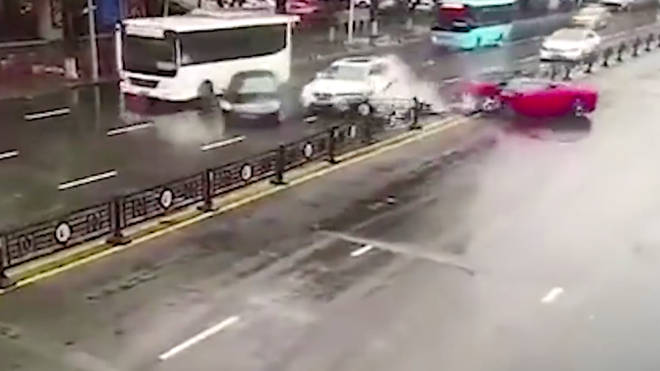The moment a rented Ferrari is destroyed after colliding with oncoming traffic.