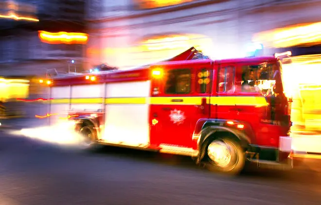 A fire engine races to an emergency call