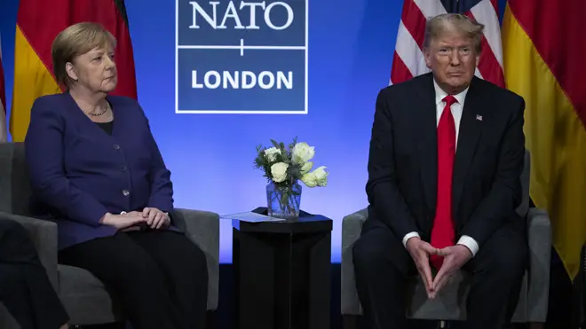Donald Trump left the Nato summit, calling Justin Trudeau 'two-faced'