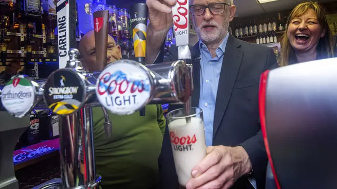 Labour leader Jeremy Corbyn attempting to pull a pint