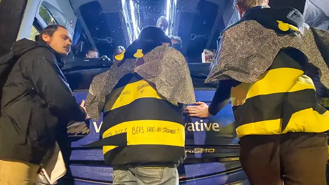 Three of the eight protesters glued themselves to the bus