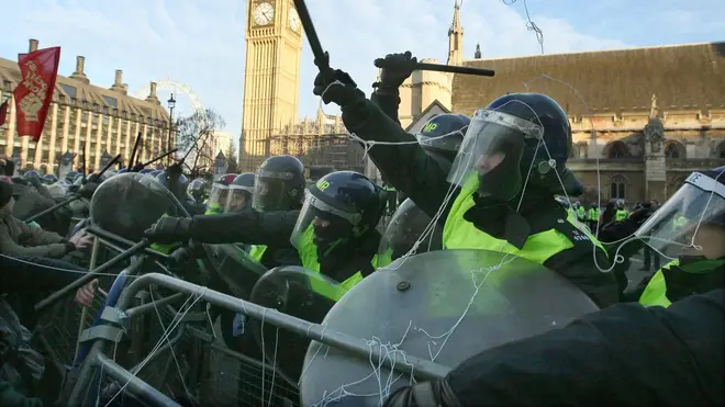 Riot police in Parliament Square during the protests