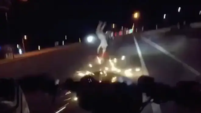 Sparks could be seen flying as the biker was sent into a somersault