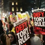 Hundreds of protesters have descended on Downing Street after Boris Johnson's landslide election victory.
