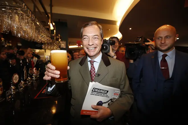 Nigel Farage, who Tim Martin supported in the election, leaving a Wetherspoons pub