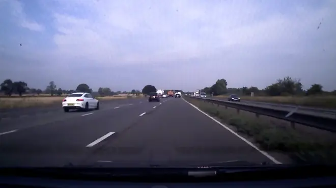 The white Mercedes seen in the inside lane moments before colliding with the Mini