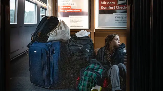 The climate activist pictured herself sitting on the floor of the train
