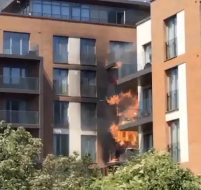 Fire engulfs several balconies at a block of flats in West Hamstead