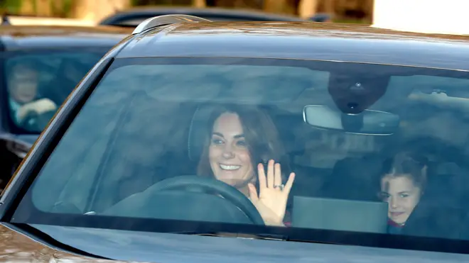 The Duchess of Cambridge and her daughter Princess Charlotte arrive for the Queen's Christmas lunch