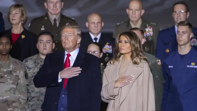 US President Donald J. Trump and First Lady Melania Trump participate in the signing ceremony for the National Defense Authorization Act in Maryland US