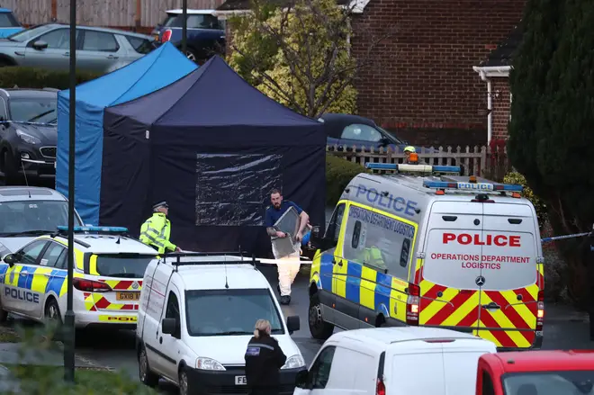 Police at a scene in Hazel Way, Crawley Down, West Sussex, where two people are feared dead after a reported stabbing.