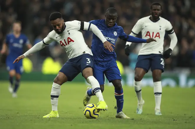 Tottenham's Danny Rose, left, is challenged by Chelsea's N'Golo Kante during the English Premier League soccer match between Tottenham Hotspur and Chelsea
