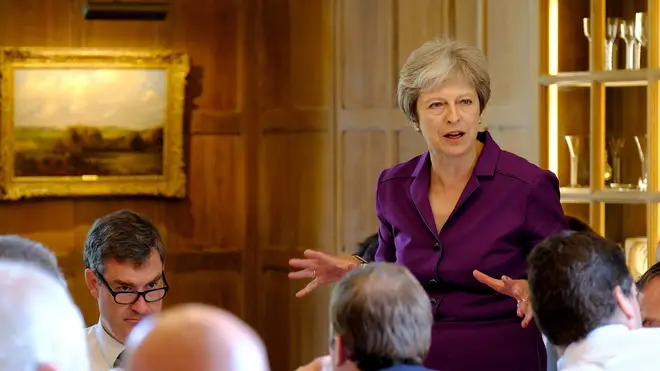 Theresa May speaking to Cabinet Members at Chequers