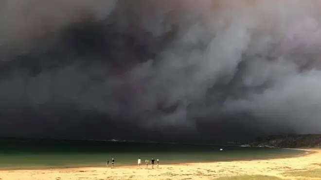 The town of Long Beach, Batemans Bay is across the water, obstructed by smoke