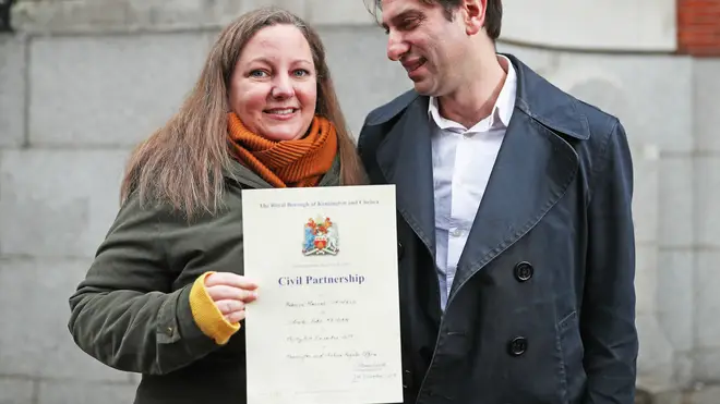 The happy couple after becoming one of the first couples to register for a civil partnership.