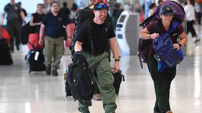 A team of 39 American firefighters arrived in Australia on Thursday to help with emergency efforts