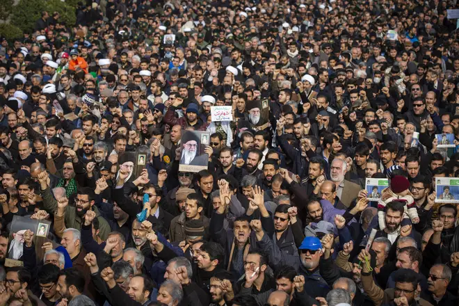 Thousands have taken to the streets in Iran to mourn the death of Soleimani