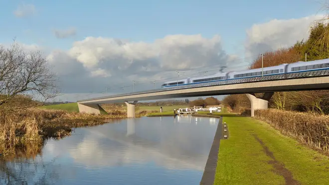 An artist's impression of an HS2 train on the Birmingham and Fazeley viaduct