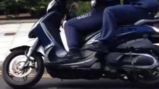 Thugs on moped threaten baby with blade