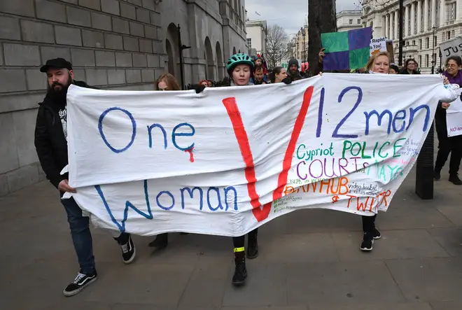 A banner reads "One woman versus 12 men"