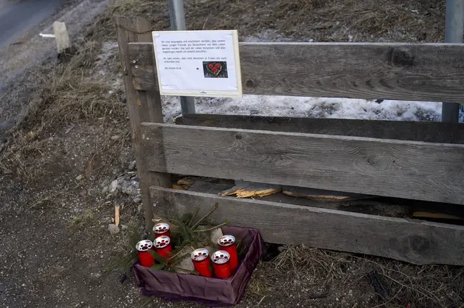 Candle and a commemoration letter placed at the at the scene where a car had plowed into a group of people in Luttach