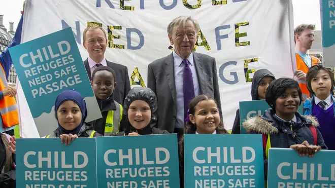 Lord Alf Dubs with children as campaigners from Safe Passage UK and Lord Alf Dubs Children Fund