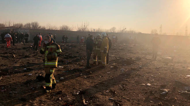 Emergency workers at the crash site