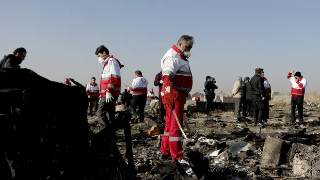 Rescue workers at the site of the crash