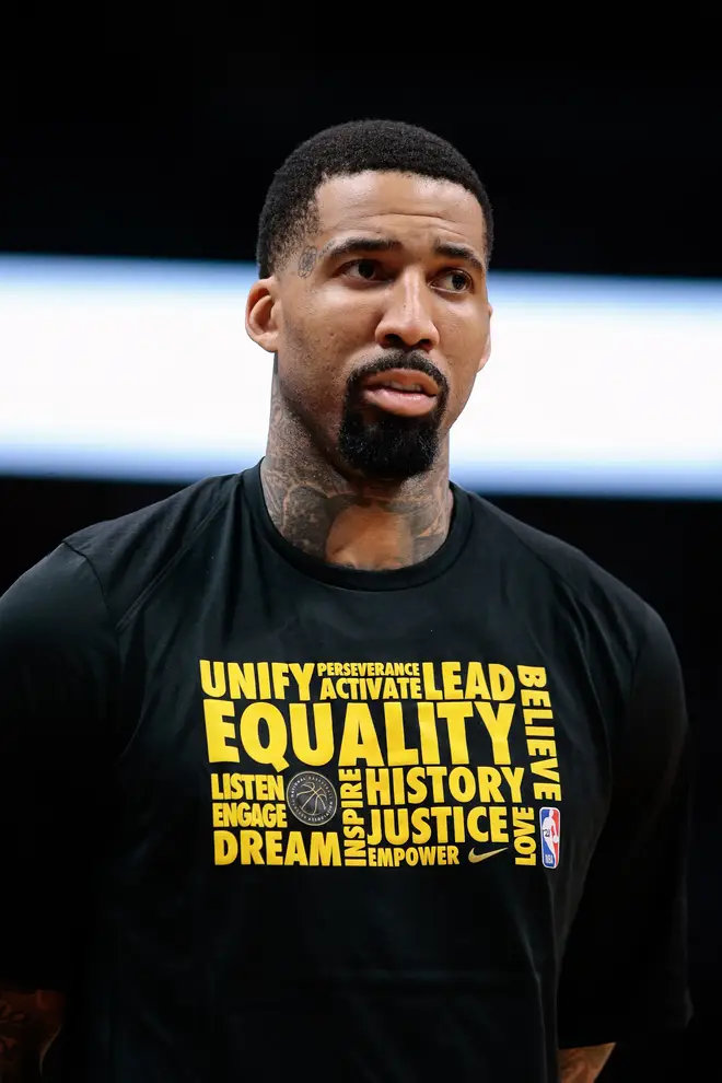 American basketball player Wilson Chandler wears a shirt for black history month