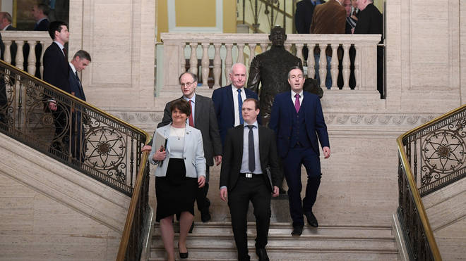 Arlene Foster of the DUP leads her party into the chamber at Stormont