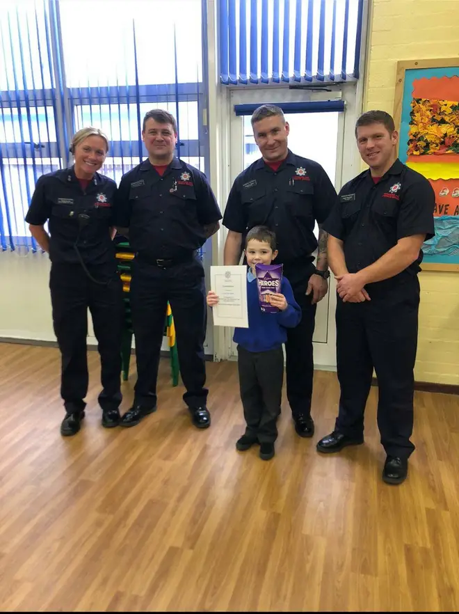 Firefighters presented him with a box of Heroes