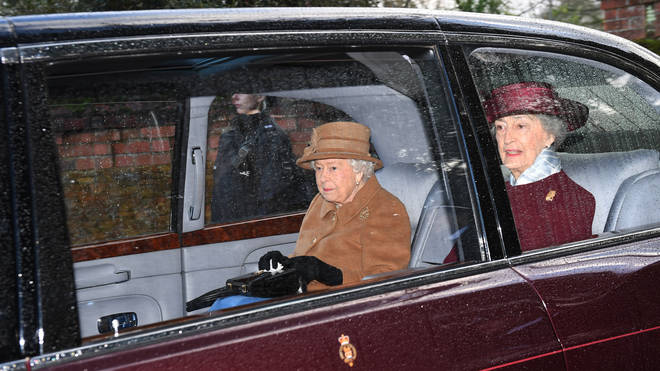 Queen Elizabeth II leaves after attending a morning church service at St Mary Magdalene Church in Sandringham, Norfolk yesterday