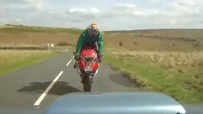 Footage from the car which hit the biker shows the moment before the impact