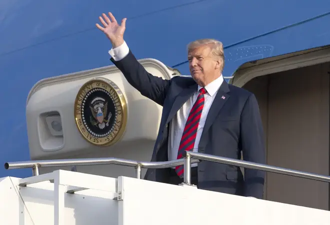 Donald Trump disembarks Air Force One in Scotland