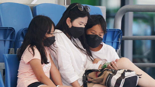 Spectators wore masks as protection against the poor air quality