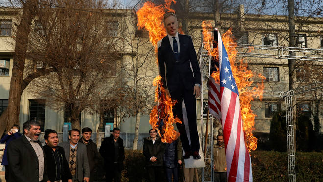 An effigy of the ambassador was burned as part of a demonstration