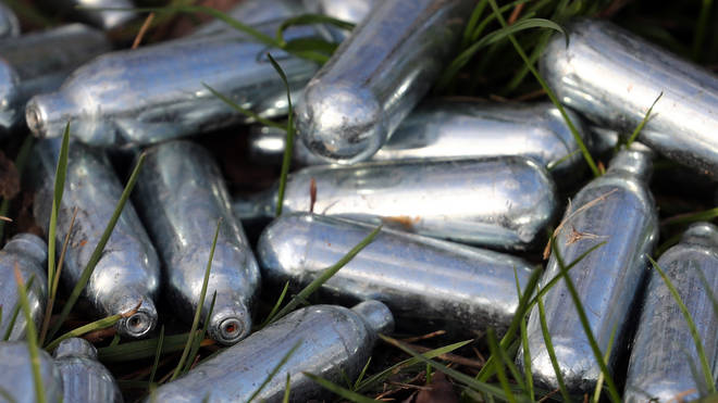 Discarded laughing gas canisters
