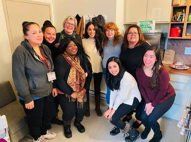 Meghan was pictured at a women's shelter in Canada