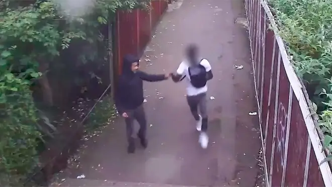 The teenagers fist-bump each other shortly after stabbing a man to death
