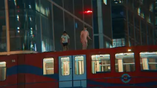 YouTubers condemned for leaping from moving DLR train.