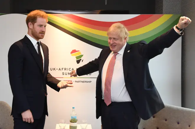 Prince Harry pictured with UK Prime Minister Boris Johnson