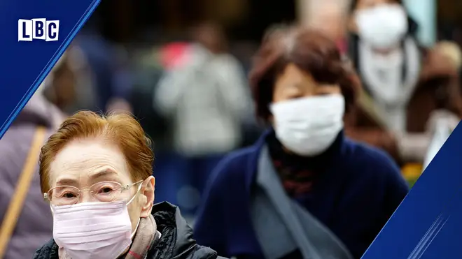 People in China protect themselves from the coronavirus
