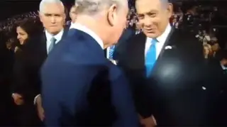 Prince Charles skips a handshake with Mike Pence