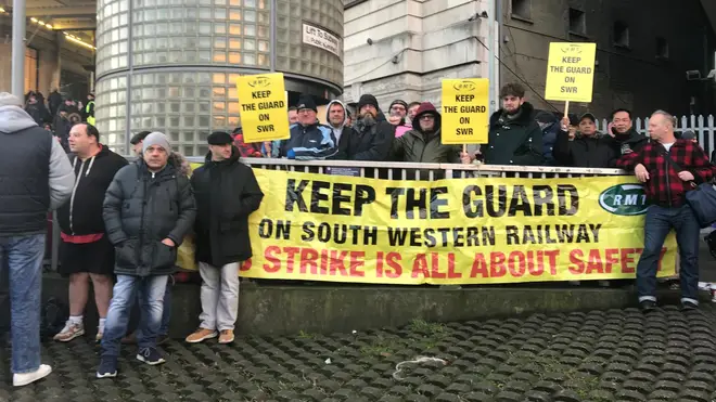 RMT members protest outside Waterloo station
