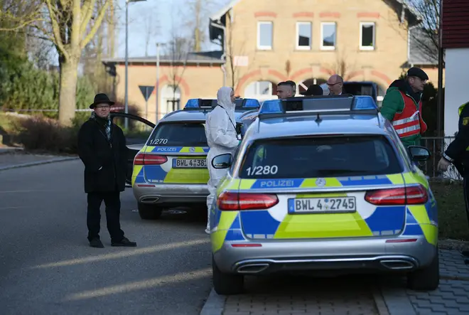 Police at the scene where six people were shot dead in Germany