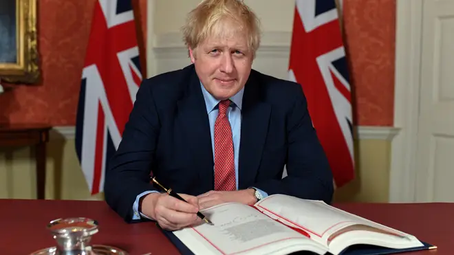 Boris Johnson formally signs the Brexit deal