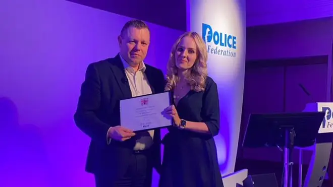 Lissie Harper and Police Federation Chair John Apter