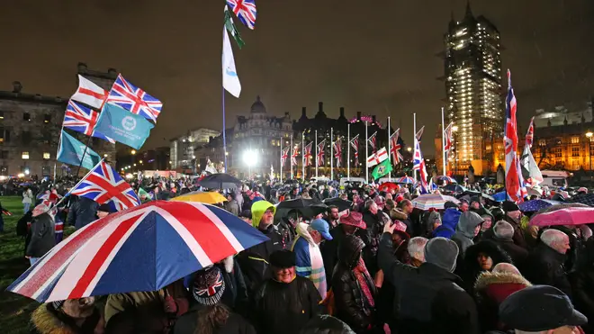 People gather to bring in Brexit in Parliament Square