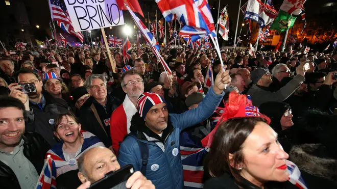 People celebrate Brexit in Parliament Square